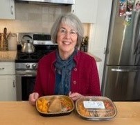 Savory Fare founder with turkey dinners