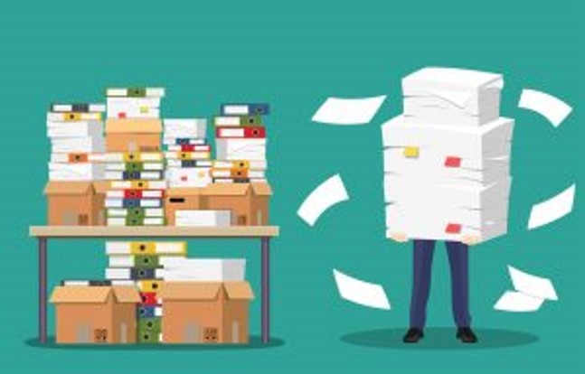 Worker Using Under Paper How to Adapt Lean Manufacturing For a Lean Office, Part 2 - Polaris MEP