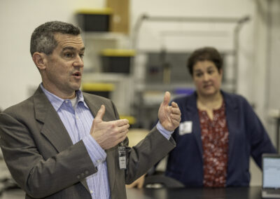 Christian Cowan, Executive Director of the URI Research Foundation, and Linda Larson, Center Director of 401 Tech Bridge, explained how 401 Tech Bridge's lab space within the JARC RI center will benefit trainees and employers.